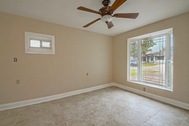 3760 W Louisiana State Dr, Kenner, LA 70065 - empty room featuring baseboards and a ceiling fan