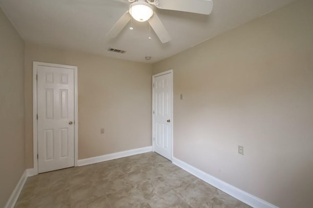 3760 W Louisiana State Dr, Kenner, LA 70065 - unfurnished bedroom featuring baseboards, a ceiling fan, and visible vents