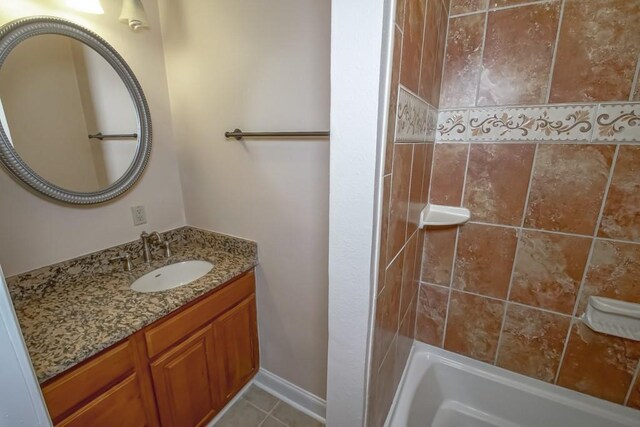 3760 W Louisiana State Dr, Kenner, LA 70065 - bathroom with vanity and tile patterned flooring