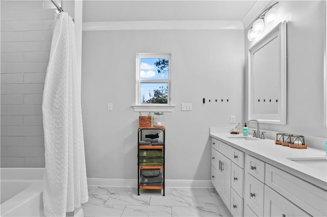 bathroom with double vanity, marble finish floor, shower / bath combo, a sink, and baseboards