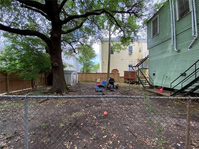 520002 Magazine St, New Orleans, LA 70115 - fenced backyard featuring stairway