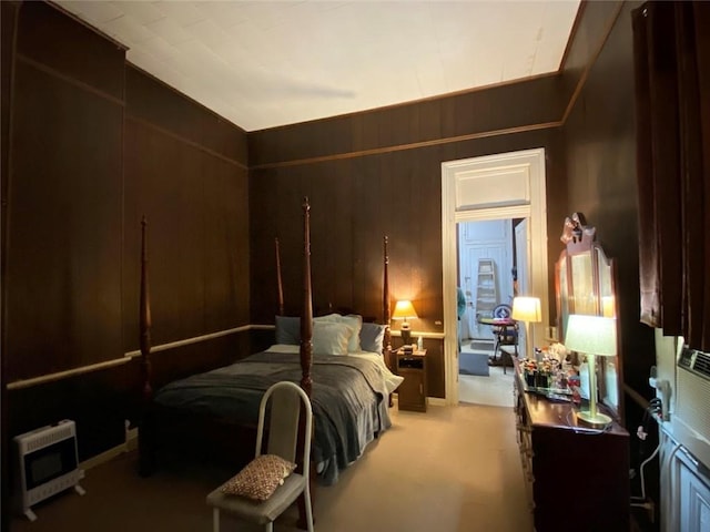 520002 Magazine St, New Orleans, LA 70115 - bedroom with heating unit, carpet, and wood walls