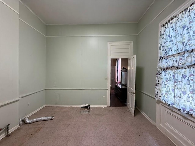 520002 Magazine St, New Orleans, LA 70115 - spare room featuring baseboards