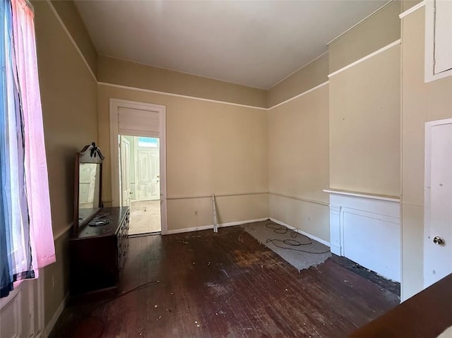 520002 Magazine St, New Orleans, LA 70115 - empty room with hardwood / wood-style flooring and baseboards