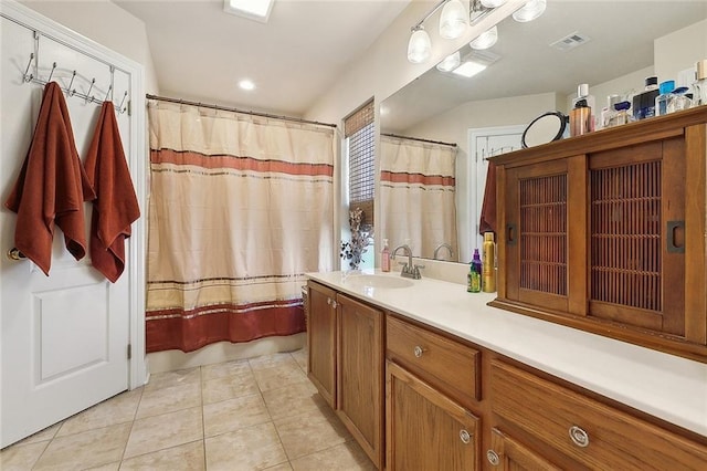 bathroom with recessed lighting, visible vents, tile patterned flooring, and vanity