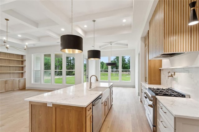 kitchen with coffered ceiling, light wood-style flooring, stainless steel appliances, and a sink