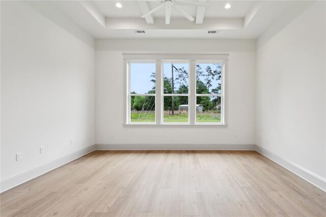 empty room with a ceiling fan, visible vents, recessed lighting, and light wood-style floors