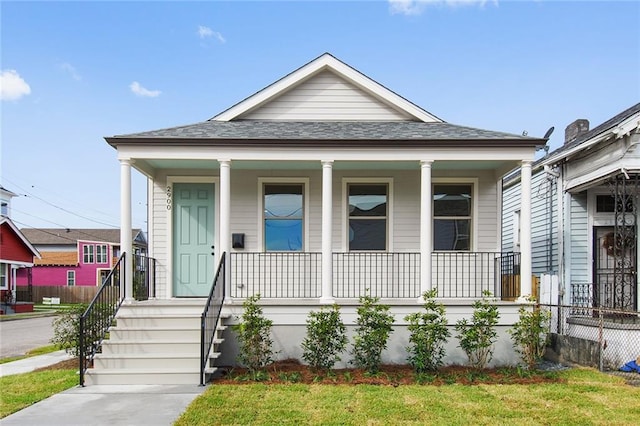 2900 General Taylor St, New Orleans, LA 70115 - view of front of home with fence and covered porch