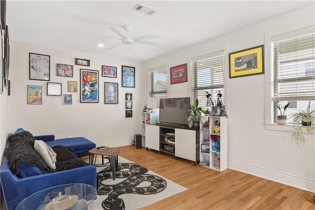 2900 General Taylor St, New Orleans, LA 70115 - living area featuring baseboards, ceiling fan, light wood finished floors, and visible vents