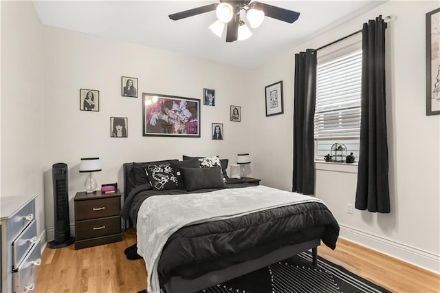 2900 General Taylor St, New Orleans, LA 70115 - bedroom featuring baseboards, ceiling fan, and light wood-style flooring