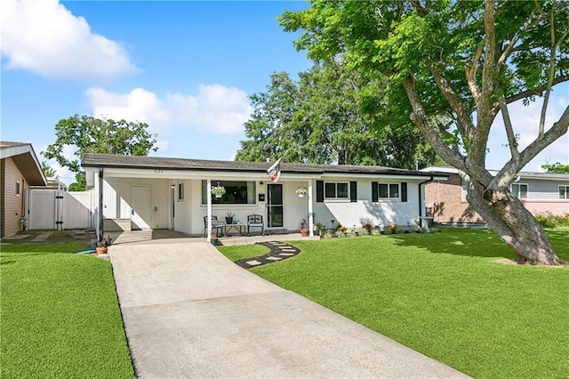 8123 Dalton St, Metairie, LA 70003 - ranch-style house featuring a gate, concrete driveway, and an attached carport
