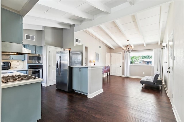 8123 Dalton St, Metairie, LA 70003 - kitchen featuring stainless steel appliances, under cabinet range hood, a chandelier, light countertops, and dark wood finished floors