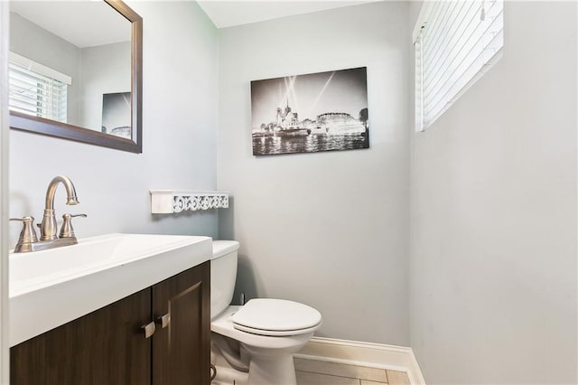 8123 Dalton St, Metairie, LA 70003 - half bath featuring toilet, vanity, and baseboards