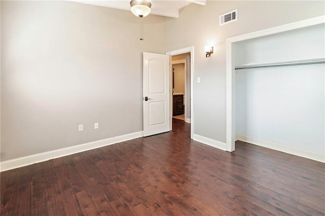 8123 Dalton St, Metairie, LA 70003 - unfurnished bedroom featuring baseboards, wood finished floors, a closet, a towering ceiling, and ceiling fan