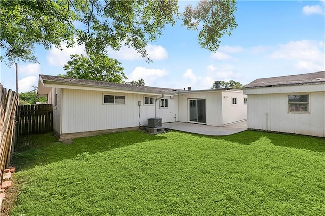 8123 Dalton St, Metairie, LA 70003 - back of property with a patio and central AC unit