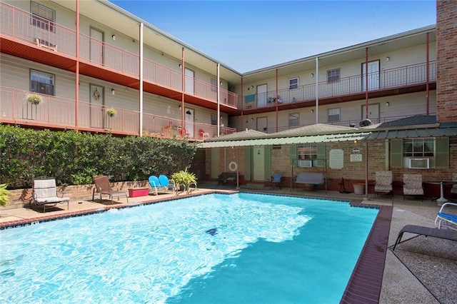 community pool featuring a patio