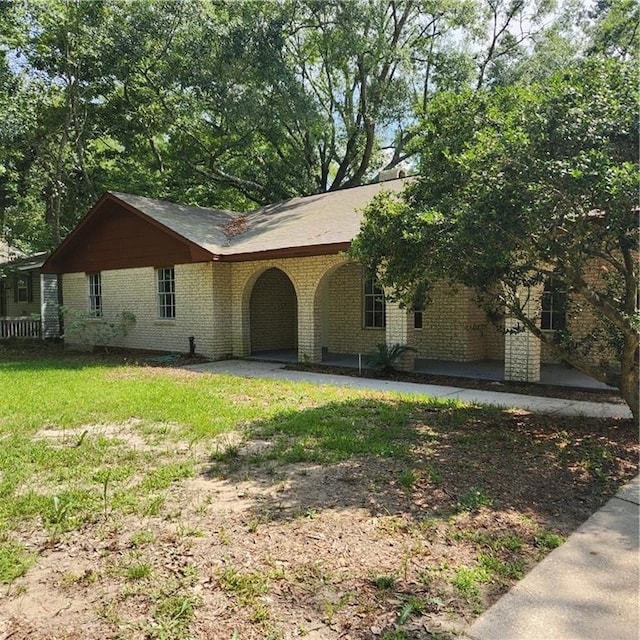 34084 Reilly Rd, Slidell, LA 70460 - single story home with a front lawn and brick siding