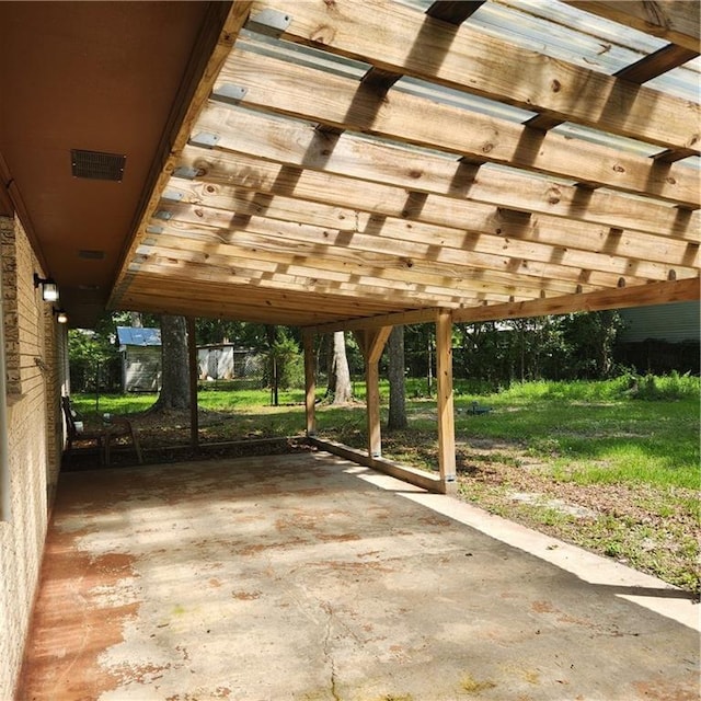 34084 Reilly Rd, Slidell, LA 70460 - view of patio featuring visible vents and a carport