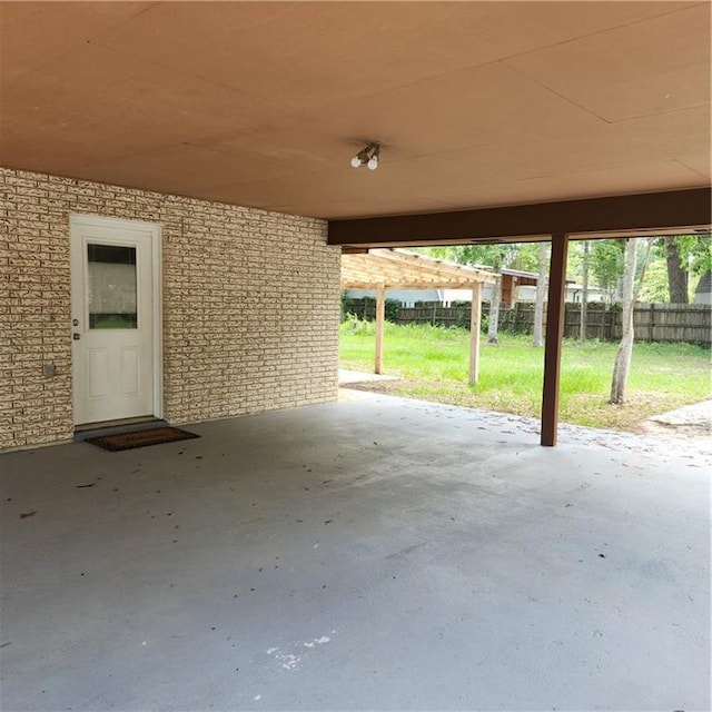 34084 Reilly Rd, Slidell, LA 70460 - view of patio / terrace with an attached carport and fence