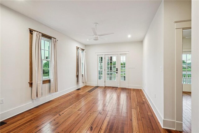 720 Moss St, New Orleans, LA 70119 - empty room featuring hardwood / wood-style flooring, ceiling fan, baseboards, and recessed lighting