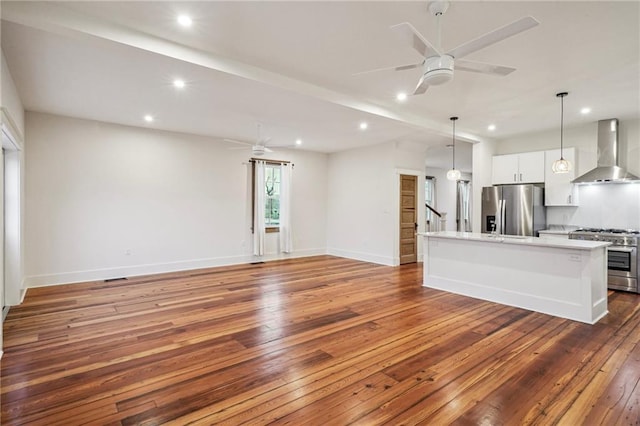 720 Moss St, New Orleans, LA 70119 - unfurnished living room featuring wood-type flooring, ceiling fan, recessed lighting, and baseboards