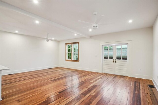 720 Moss St, New Orleans, LA 70119 - unfurnished room with a ceiling fan, light wood-style floors, plenty of natural light, and recessed lighting