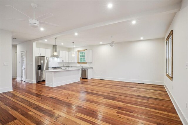 720 Moss St, New Orleans, LA 70119 - unfurnished living room featuring ceiling fan, wood-type flooring, and recessed lighting
