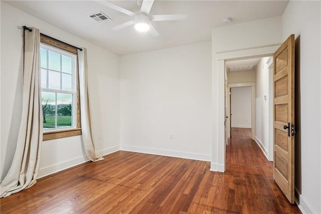 720 Moss St, New Orleans, LA 70119 - unfurnished room with wood finished floors, baseboards, a ceiling fan, and a smoke detector