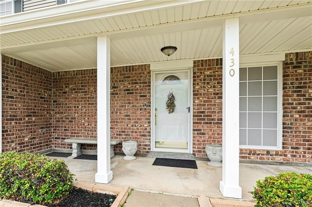 430 Holmes Dr, Slidell, LA 70460 - property entrance with covered porch and brick siding