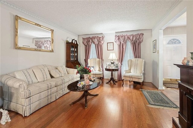 430 Holmes Dr, Slidell, LA 70460 - living area with crown molding, wood finished floors, and a textured ceiling