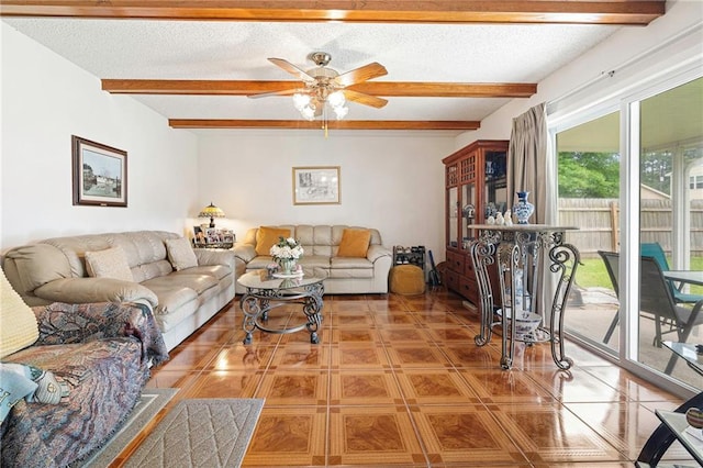 430 Holmes Dr, Slidell, LA 70460 - living room featuring beamed ceiling, tile patterned floors, and ceiling fan