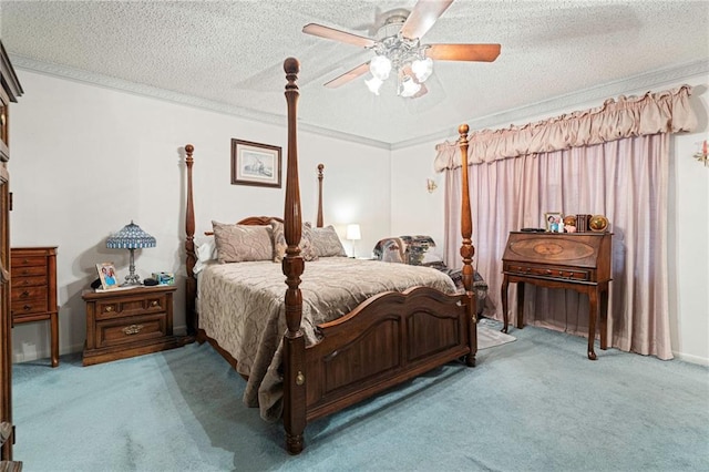 430 Holmes Dr, Slidell, LA 70460 - carpeted bedroom featuring a ceiling fan, crown molding, and a textured ceiling