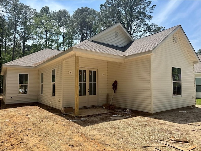 20326 Quincy Ave, Covington, LA 70433 - view of front facade featuring roof with shingles and french doors