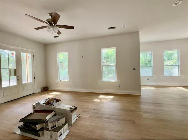 20326 Quincy Ave, Covington, LA 70433 - unfurnished living room with baseboards, light wood finished floors, recessed lighting, and ceiling fan