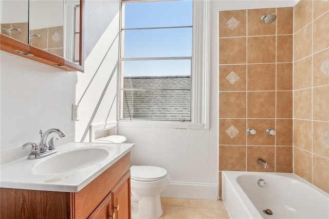 201921 N Rampart St, New Orleans, LA 70116 - bathroom with vanity, tile patterned flooring, toilet, baseboards, and shower / bathing tub combination