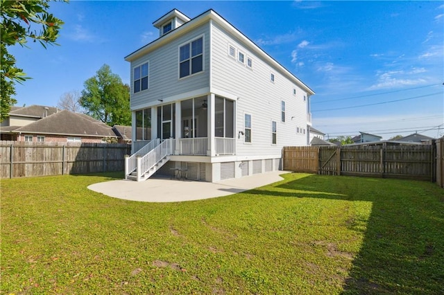 417 28th St, New Orleans, LA 70124 - rear view of house with a sunroom, a patio area, and a ceiling fan
