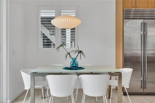 1704 Milan St, New Orleans, LA 70115 - dining room featuring light tile patterned flooring