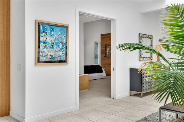 1704 Milan St, New Orleans, LA 70115 - hallway with baseboards and light tile patterned flooring