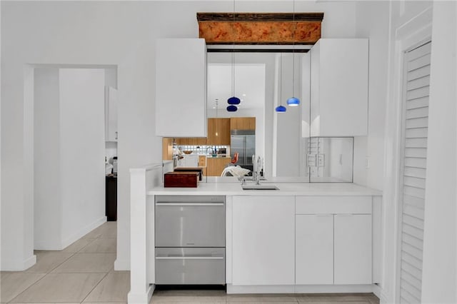 1704 Milan St, New Orleans, LA 70115 - bar with light tile patterned floors, a sink, appliances with stainless steel finishes, and baseboards
