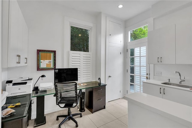 1704 Milan St, New Orleans, LA 70115 - office area featuring recessed lighting, light tile patterned flooring, and a sink