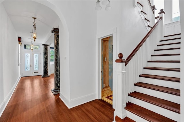 1704 Milan St, New Orleans, LA 70115 - entryway with arched walkways, wood finished floors, and plenty of natural light