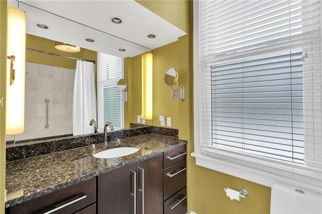 1704 Milan St, New Orleans, LA 70115 - full bathroom with a shower with curtain, vanity, and baseboards