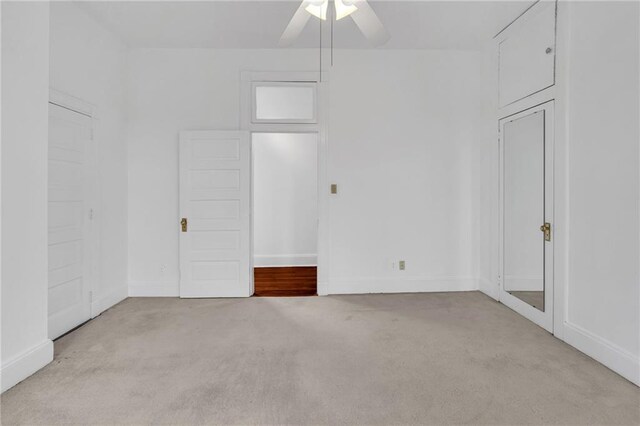 1704 Milan St, New Orleans, LA 70115 - interior space featuring a ceiling fan, carpet flooring, and baseboards