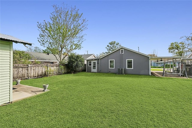 8335 Huntley Ln, Harahan, LA 70123 - view of yard featuring a patio, a fenced backyard, and ceiling fan