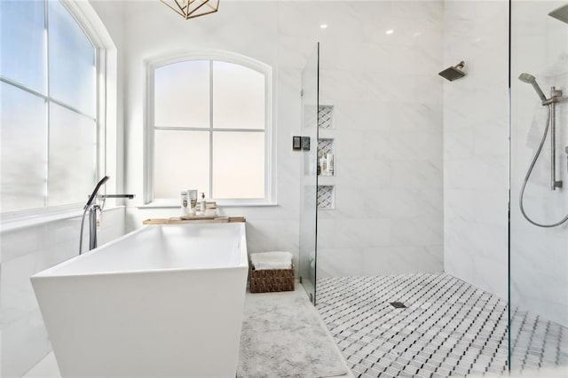 544 Belle Pointe Loop, Madisonville, LA 70447 - full bath featuring walk in shower and a freestanding tub