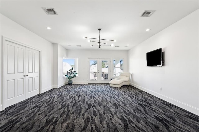 544 Belle Pointe Loop, Madisonville, LA 70447 - unfurnished room featuring a chandelier, visible vents, baseboards, and french doors