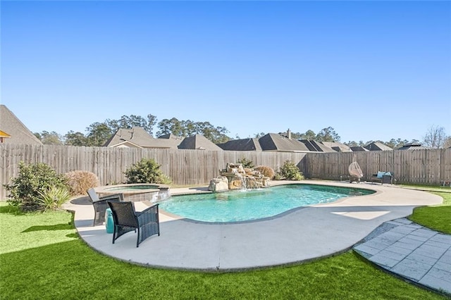 544 Belle Pointe Loop, Madisonville, LA 70447 - view of pool featuring a lawn, a fenced backyard, a pool with connected hot tub, and a patio