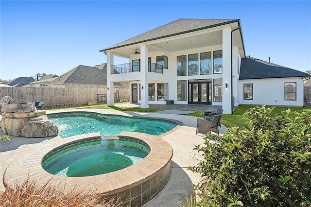 544 Belle Pointe Loop, Madisonville, LA 70447 - rear view of house featuring a ceiling fan, a fenced backyard, a balcony, french doors, and a patio