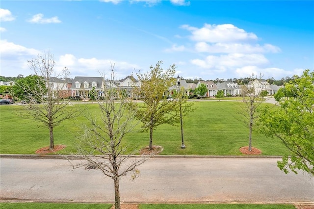 640 Bocage Ct N, Covington, LA 70433 - view of community with a residential view and a lawn