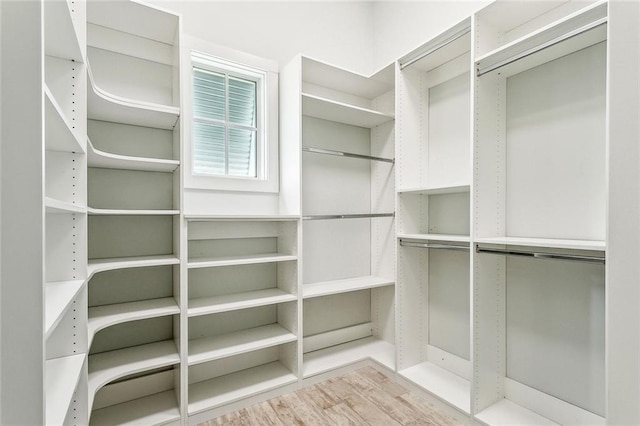 640 Bocage Ct N, Covington, LA 70433 - walk in closet featuring wood finished floors